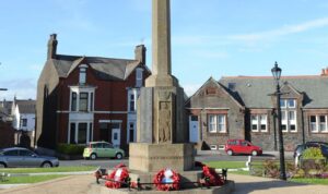 Cenotaph. View of Millom Cenotaph with wreathes