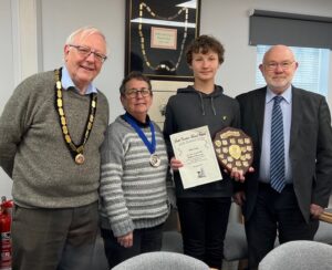 mayor and councillor presenting Bursary award to Ollie Park