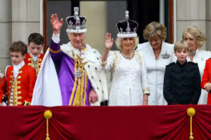 King Charles Coranation Day. King and Queen waving to crowd