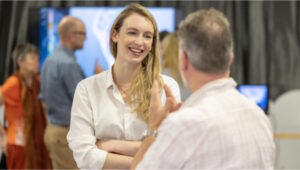 GDF Partners. man and woman talking at meeting